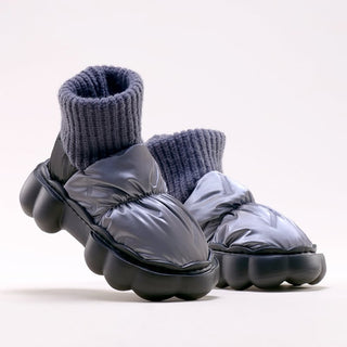 Bottes chaussettes à plateforme fourrées et imperméables pour femme.