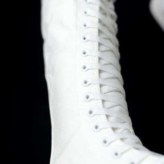 Bottes plates montantes en toile blanche pour femmes