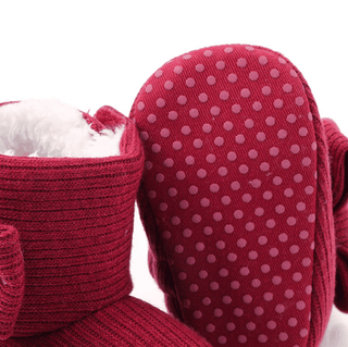 Stivaletti rossi foderati di pelliccia