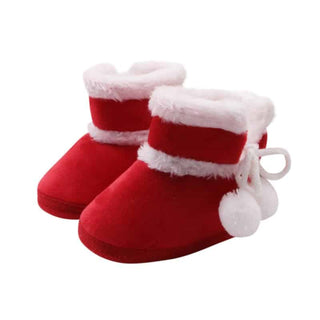 Très jolies bottes d'intérieur. Elles sont ornées de pompons blanc esprit de Noël.